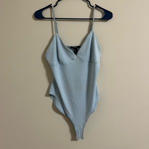 LIGHT BLUE FOREVER 21 BODY SUIT SIZE L